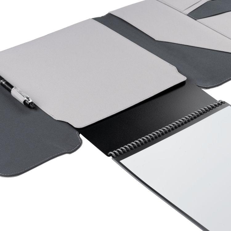 A closer view of the Rocketbook Flip sliding into a gray Flip Capsule folio cover